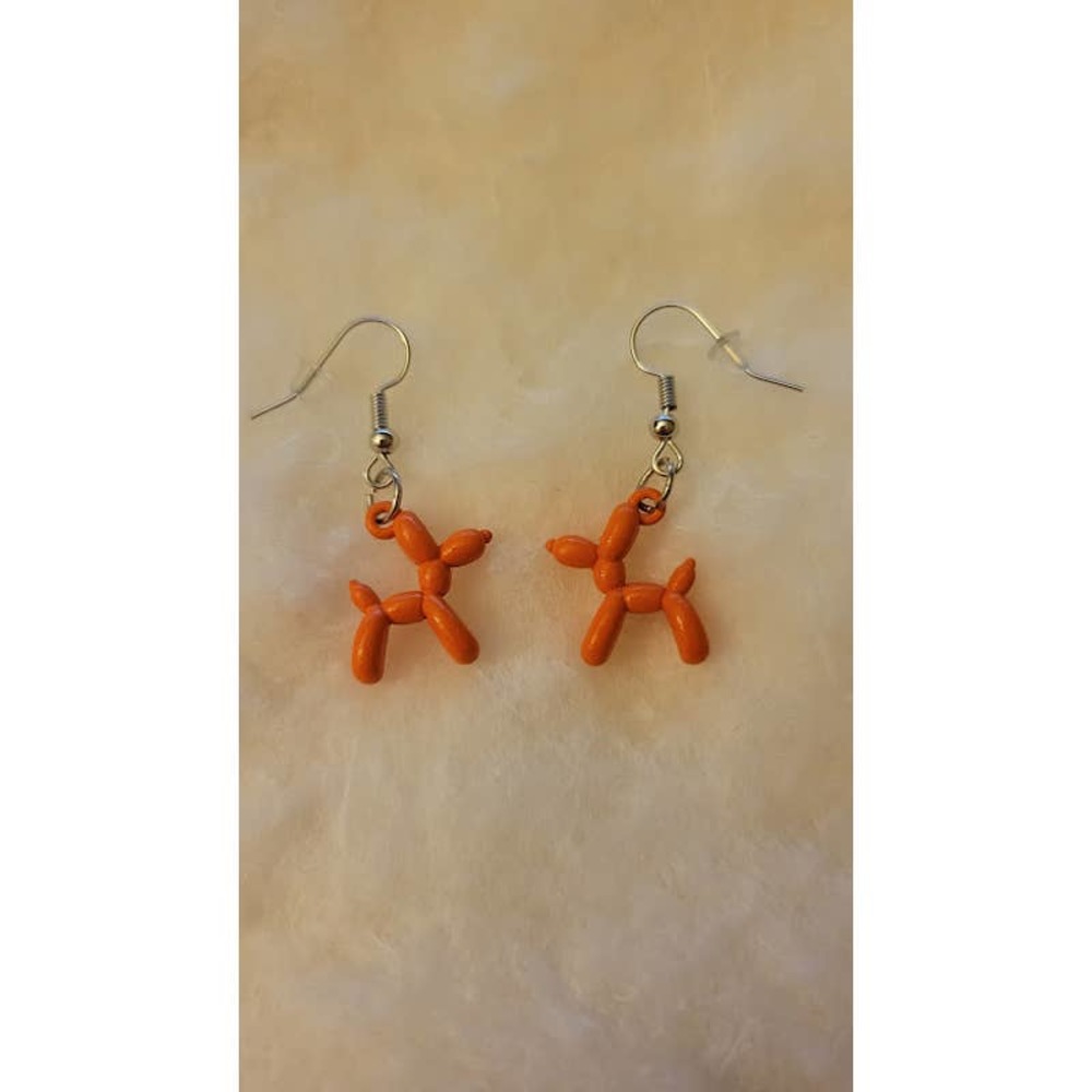 Mini orange balloon dog earrings